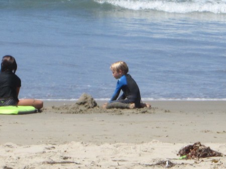 Emmett spent some of the time creating in the sand.