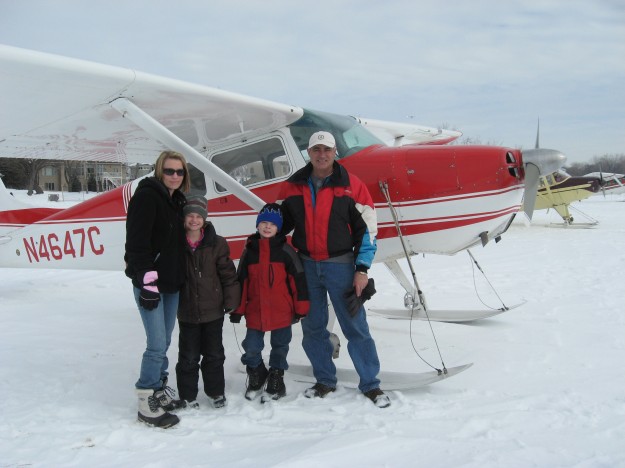 Pilot Paul Neutkens with Kim and Morgan Wood and Riley Carlson. 